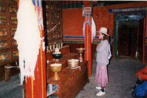 Lee Kaiser standing at the Potala palace altar